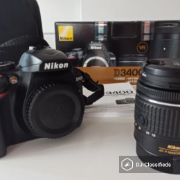 Nikon d3400 + lens + bag + tripod